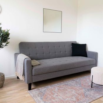 Milton Dark Grey Fabric Click Clack Sofa Bed with Black Legs